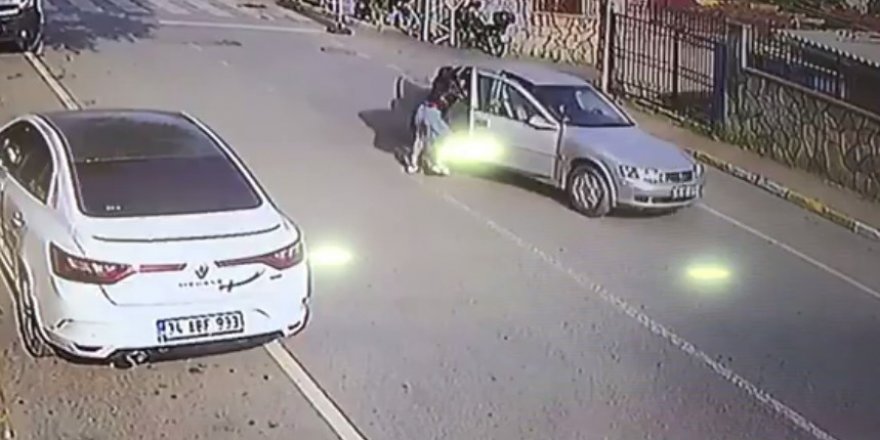 Darp ettiği kadını otomobilden attı